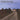 CAR WHEELS ON A GRAVEL ROAD