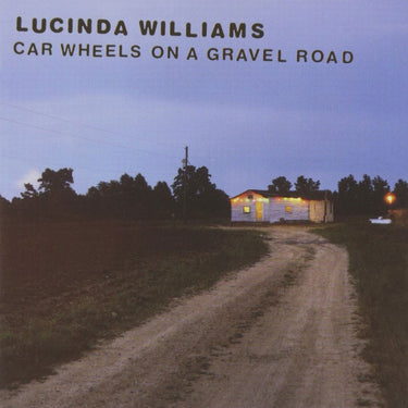 CAR WHEELS ON A GRAVEL ROAD